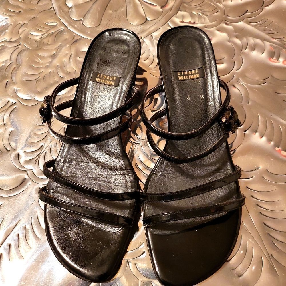 Stuart Weitzman size 6 b, blackw/ jewelry the side of each sandal, really pretty